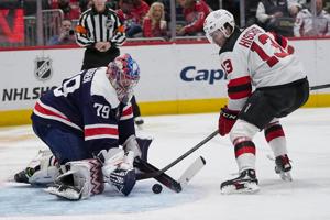 Ovechkin and McMichael each score twice as the Capitals deal the Devils a 6-2 defeat