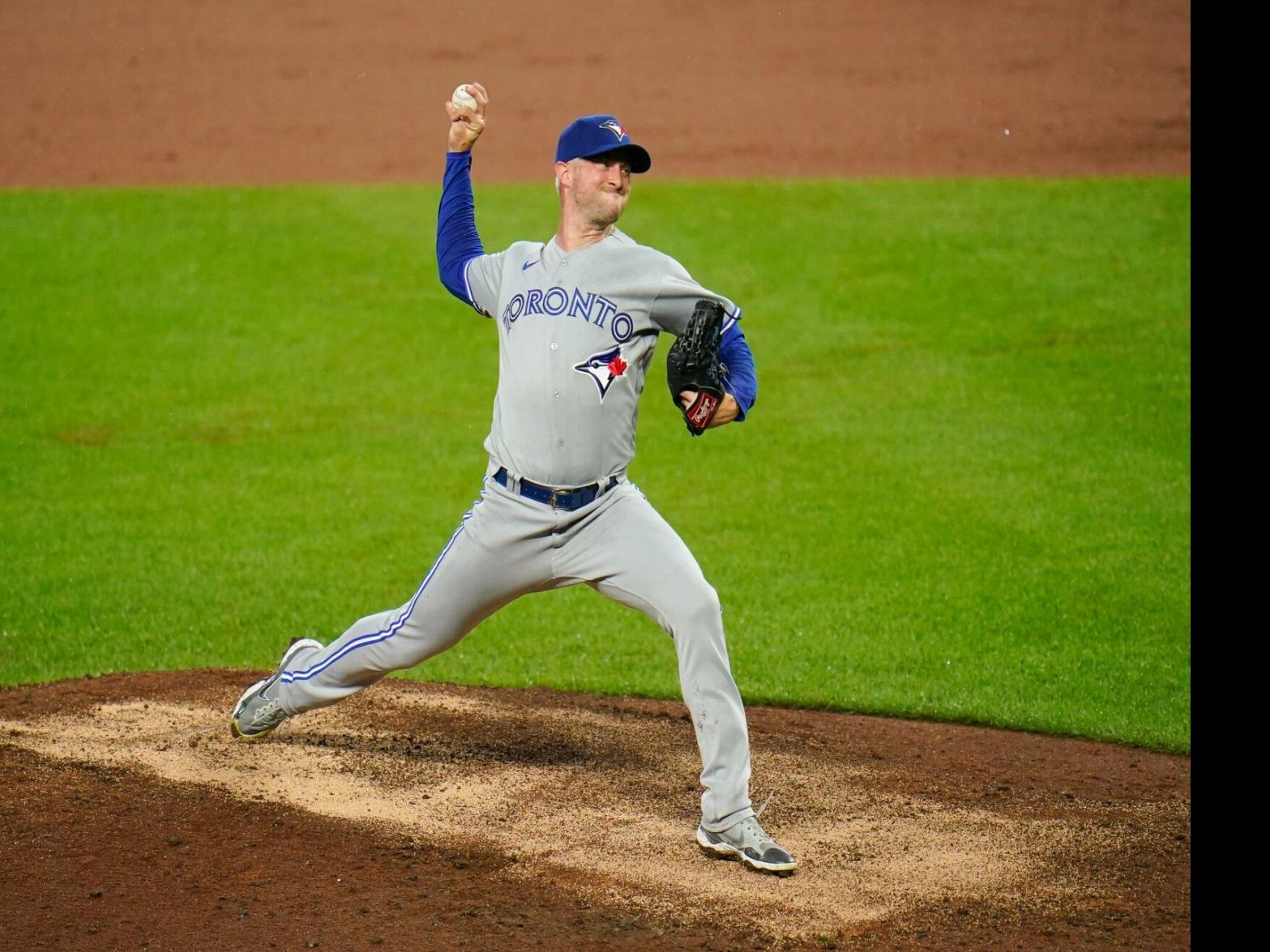 Trevor Richards of the Toronto Blue Jays pitches against the Texas