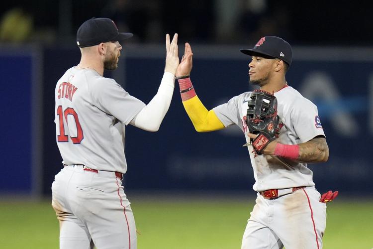 Story hits go-ahead single in 9th and Red Sox top Rays 6-3 to keep pace in playoff chase