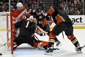 Lindholm scores, DeSimone nets first goal, and Markstrom wins 200th as Flames top Ducks 3-0