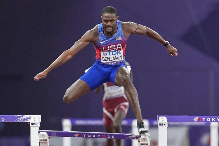 Benjamin wins 400 hurdles, is disqualified, then given worlds gold medal
