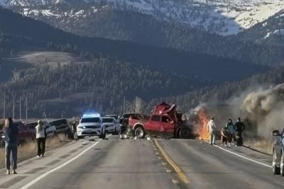 Truck crossed center line in crash with tour van that killed 7 near Yellowstone, police say