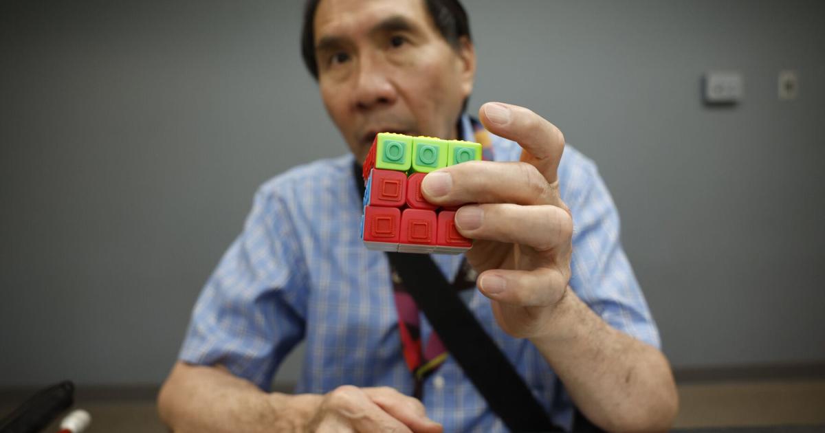 How a blind Rubik's Cube solver inspired a Brampton group's Guinness ...