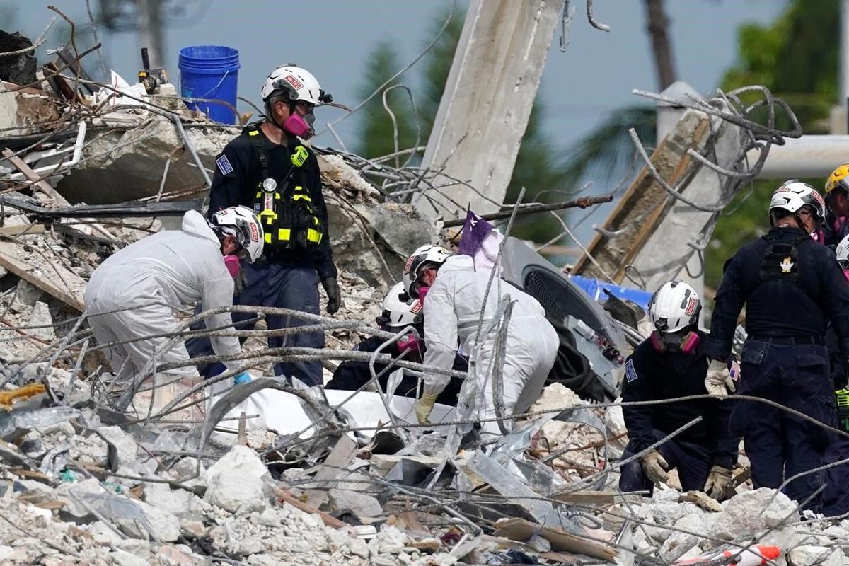 Canadian killed in Miami building collapse, three more Canadians missing