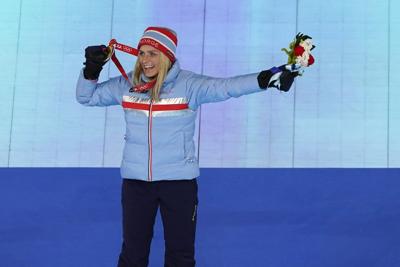 Ski great Therese Johaug puts family first and ends career before 2026 Winter Olympics