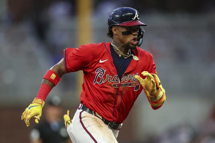Albies hits 3-run homer, Acuña has defensive gem to lead the Braves past the Yankees