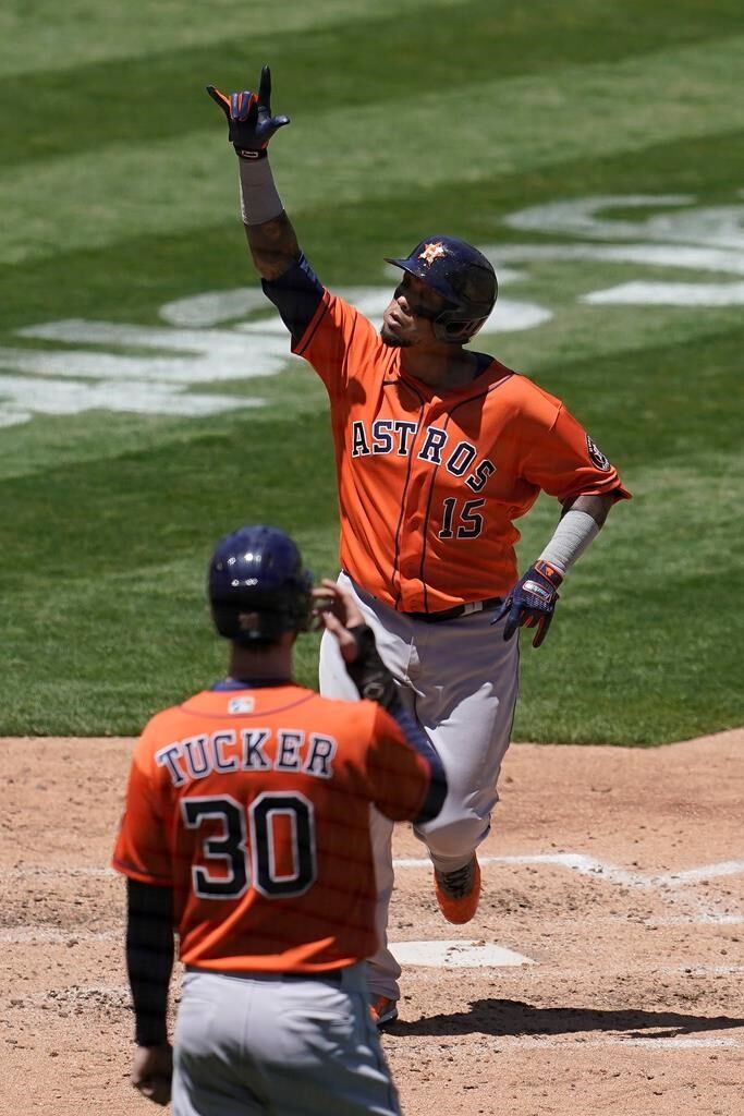 Maldonado's 3 RBIs lead Astros over A's 8-4 and into 1st