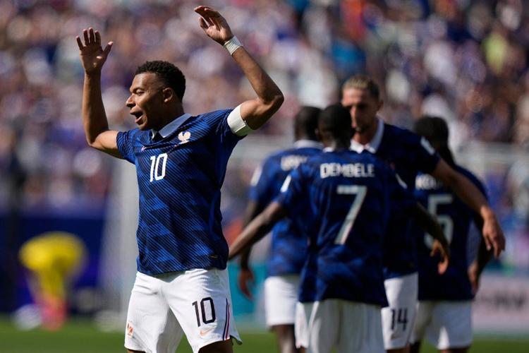 France striker Kylian Mbappé scores his 13th and 14th World Cup goals