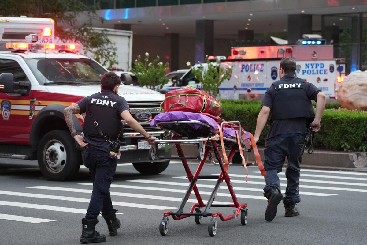 At least 5 people, including a police officer, killed in a Manhattan office  building shooting