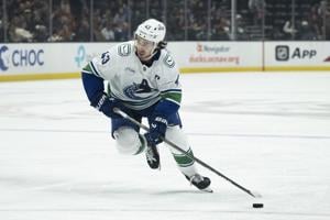 Hughes, Sasson lead Canucks to 8-1 thumping of Flames in pre-season action
