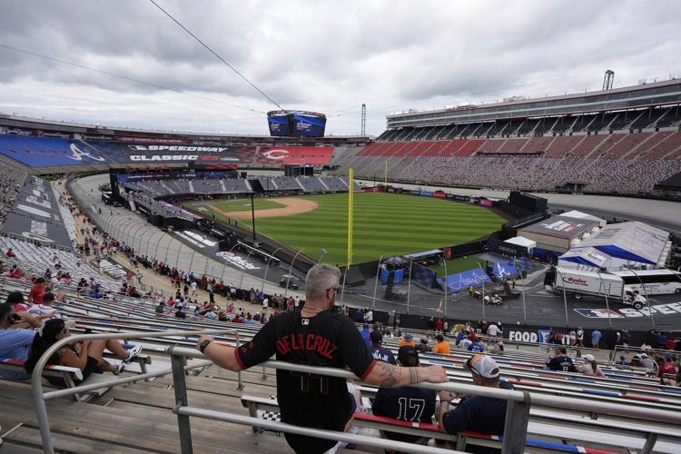White goes deep twice as the Braves beat the Reds in rain-delayed MLB Speedway Classic at Bristol