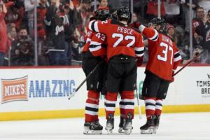 Cotter, Bratt score in shootout as Devils beat Wild 3-2