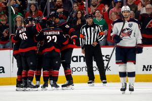 Stankoven scores twice as Hurricanes beat Blue Jackets 5-1, clinch playoff berth