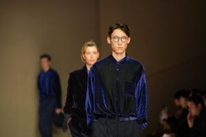 Giorgio Armani launches new era with iridescent colors and a star-studded front row