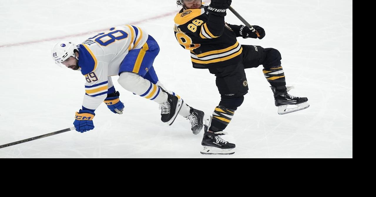 Bruins leading scored David Pastrnak leaves game with upper-body injury