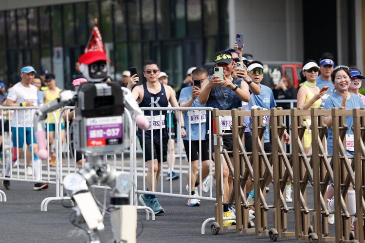 A humanoid robot sprints to victory in Beijing, beating the human half- marathon world record