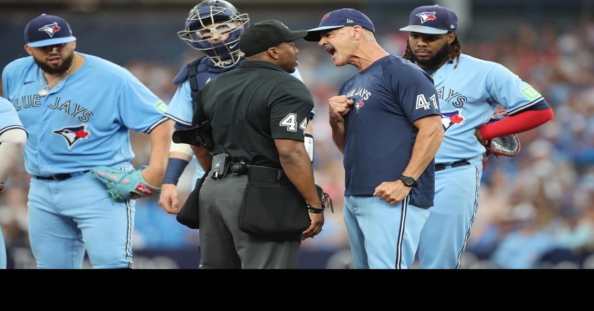 Rookie umpire ejects Blue Jays coach Pete Walker early in Toronto loss to Padres