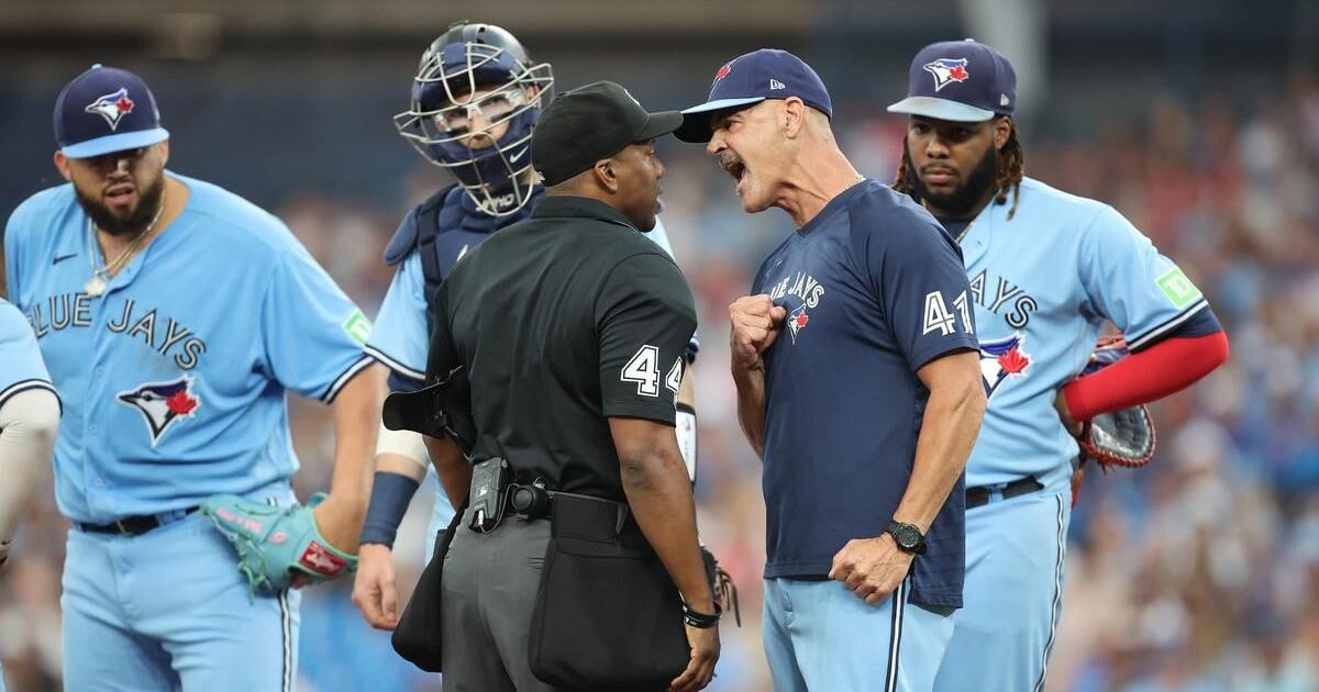 Rookie umpire ejects Blue Jays coach Pete Walker early in Toronto loss to Padres