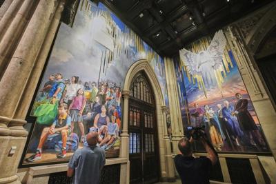 A massive mural honoring NYC immigrants now fills the entrance to St. Patrick’s Cathedral