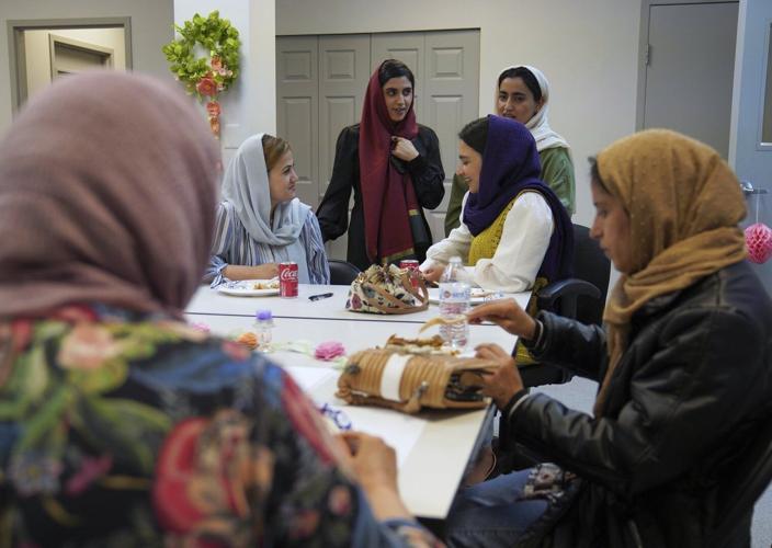 Trump policy moves worry Afghan refugees in US military town and Christian groups that assist them