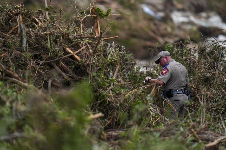 Photos of rescue teams searching for missing campers after Texas Hill Country flash flood