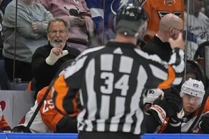 Tortorella suspended 2 games for refusing to leave Flyers' bench