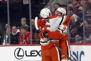 Cutter Gauthier scores twice, including in OT, to lift the Ducks over the Hurricanes 3-2