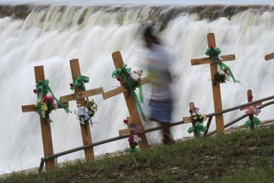 Search for Texas flood victims to resume after pause due to heavy rains