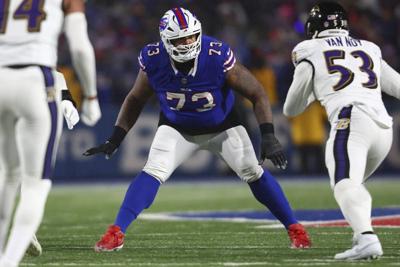 Bills restructure left tackle Dion Dawkins' contract to get under NFL's salary cap, AP source says