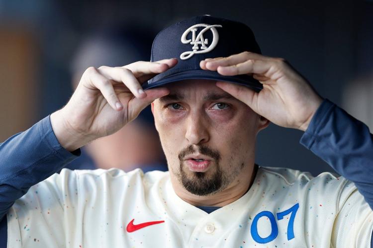 Dodgers' Blake Snell scratched from start with loose bodies in left elbow.  His return is uncertain