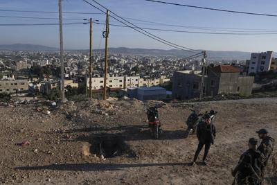 A drive-by shooting and clashes in a West Bank hot spot leave 6 Palestinians and 2 Israelis dead