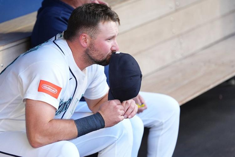 Mariners star catcher Cal Raleigh had hunch right oblique injury would ...