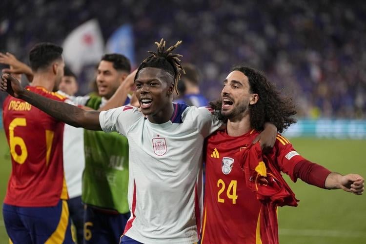 Aggrieved German supporters jeer Spain's Marc Cucurella during Euro ...