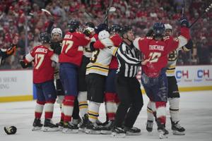 Bennett scores twice, Panthers open their title defense by getting past rival Bruins 6-4