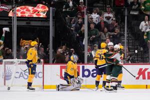 Johansson scores in OT with goal off its moorings in Wild's 3-2 victory over Predators