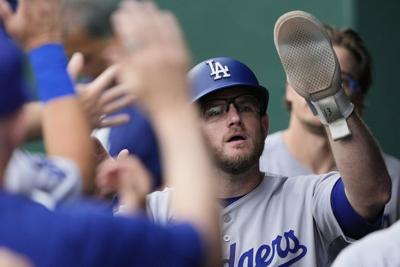 Dodgers' Max Muncy injured while tagging out Michael A. Taylor of White Sox