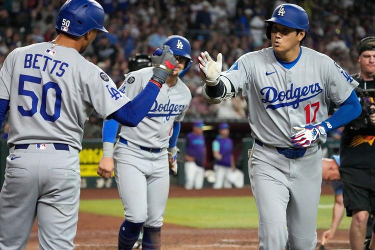 Ohtani hits 54th homer as Dodgers beat Diamondbacks 8-0 for 12th NL West title in 13 years