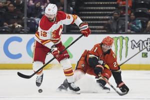 Gauthier scores late in 3rd and in OT to lift the Ducks past the Flames, 4-3