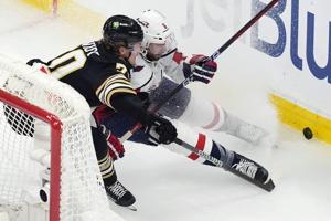 Oshie scores as Caps end skid with 3-0 win over Bruins; Ovechkin gets empty netter to pass Gretzky