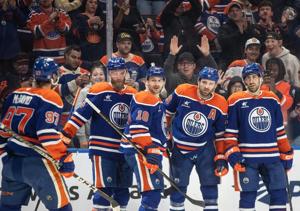 Hyman scores a pair to help Oilers to 6-3 victory over Blue Jackets