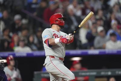 Kyle Schwarber, Bryce Harper help Phillies beat Rockies 7-4 for 5th straight victory