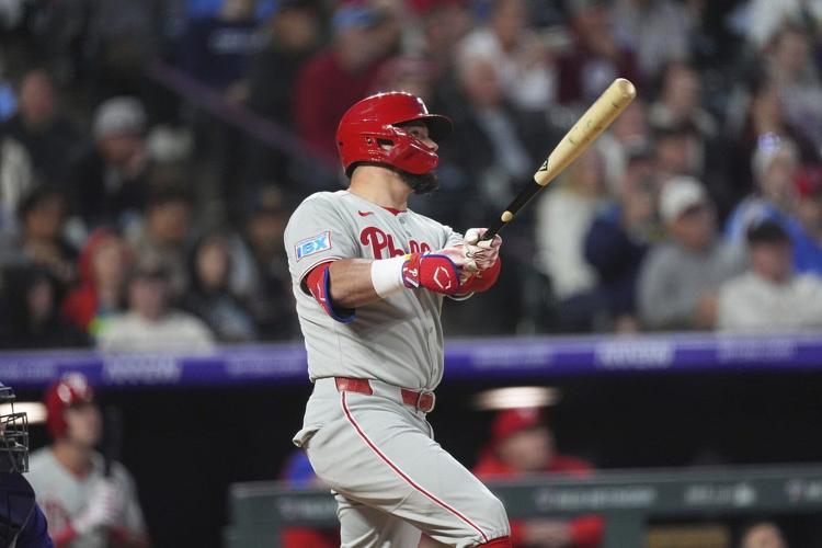 Kyle Schwarber, Bryce Harper help Phillies beat Rockies 7-4 for 5th straight victory
