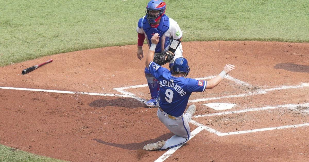 Royals catch fire with five-run 10th inning to push past Blue Jays 7-4