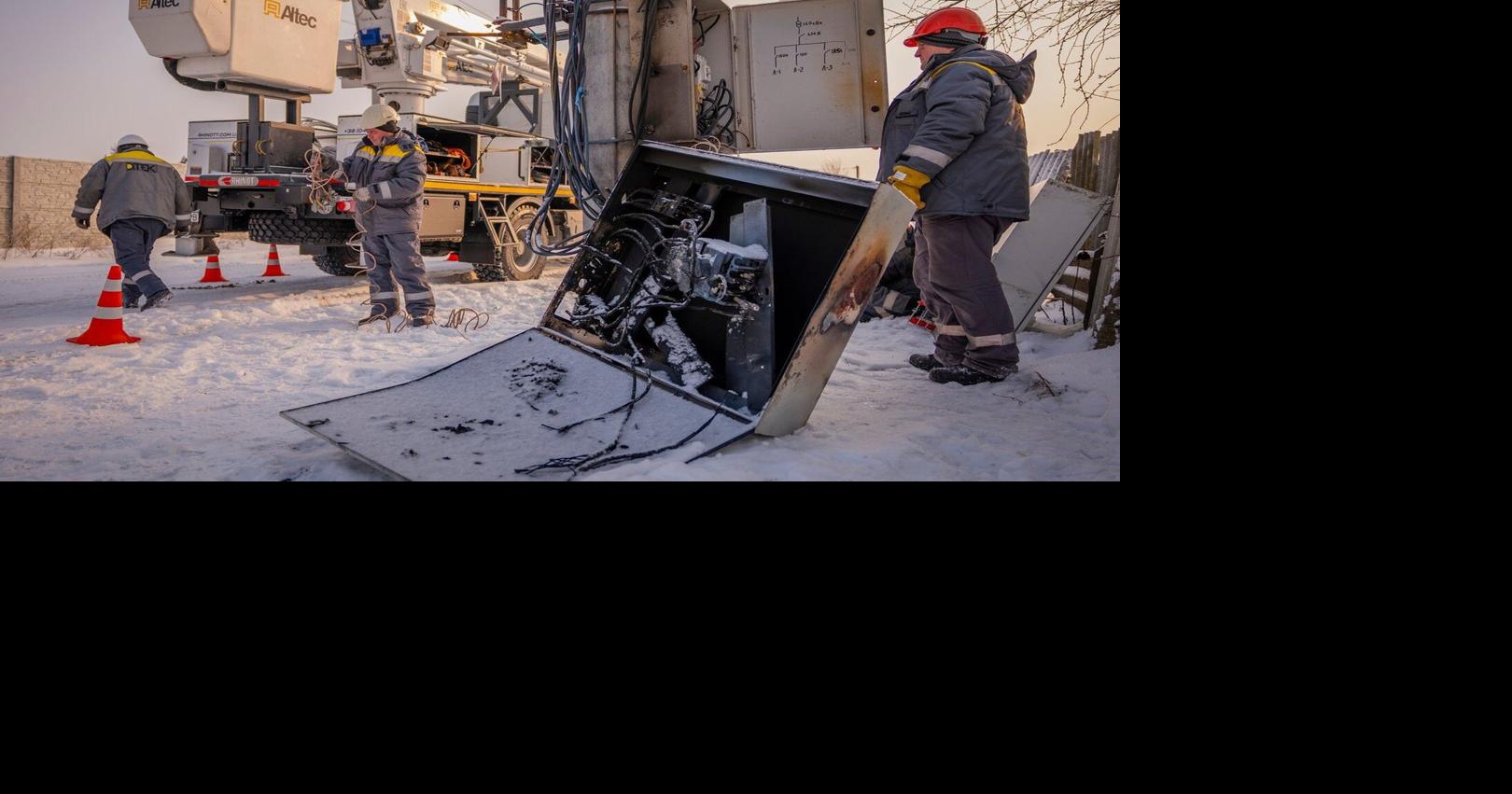 Ukrainians endure freezing temperatures at home as emergency crews rush to restore power