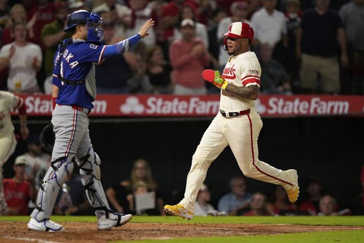 Moncada's clutch hit highlights 4-run rally that lifts Angels over Rangers 8-5