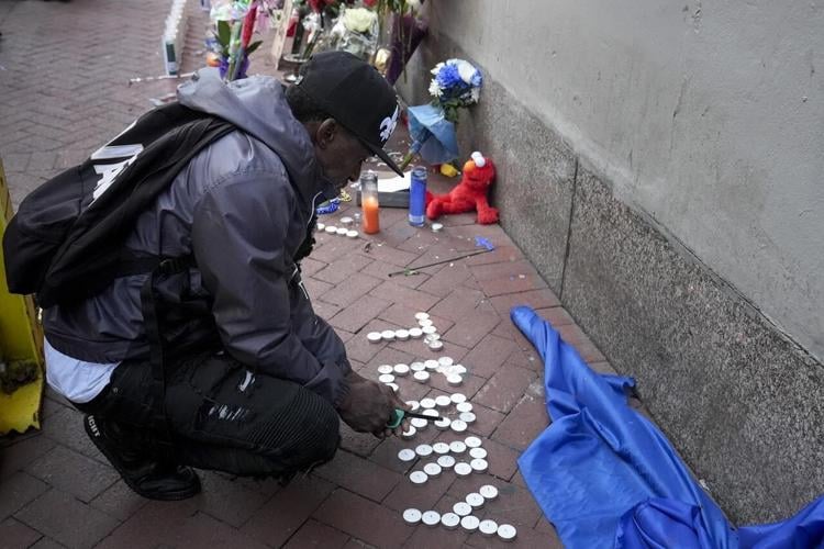 New Orleans mourns truck attack victims with tearful vigil
