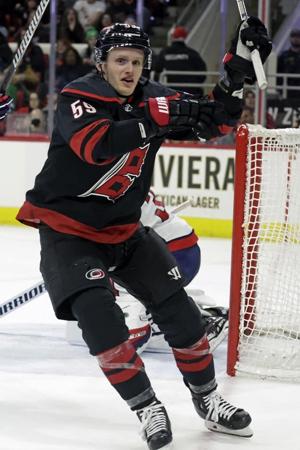 Hurricanes rally for 4-2 victory over slumping Caps. Ovechkin scores both goals for Washington.