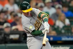 Muncy's solo homer caps off A's rally as Oakland beats Houston 7-6