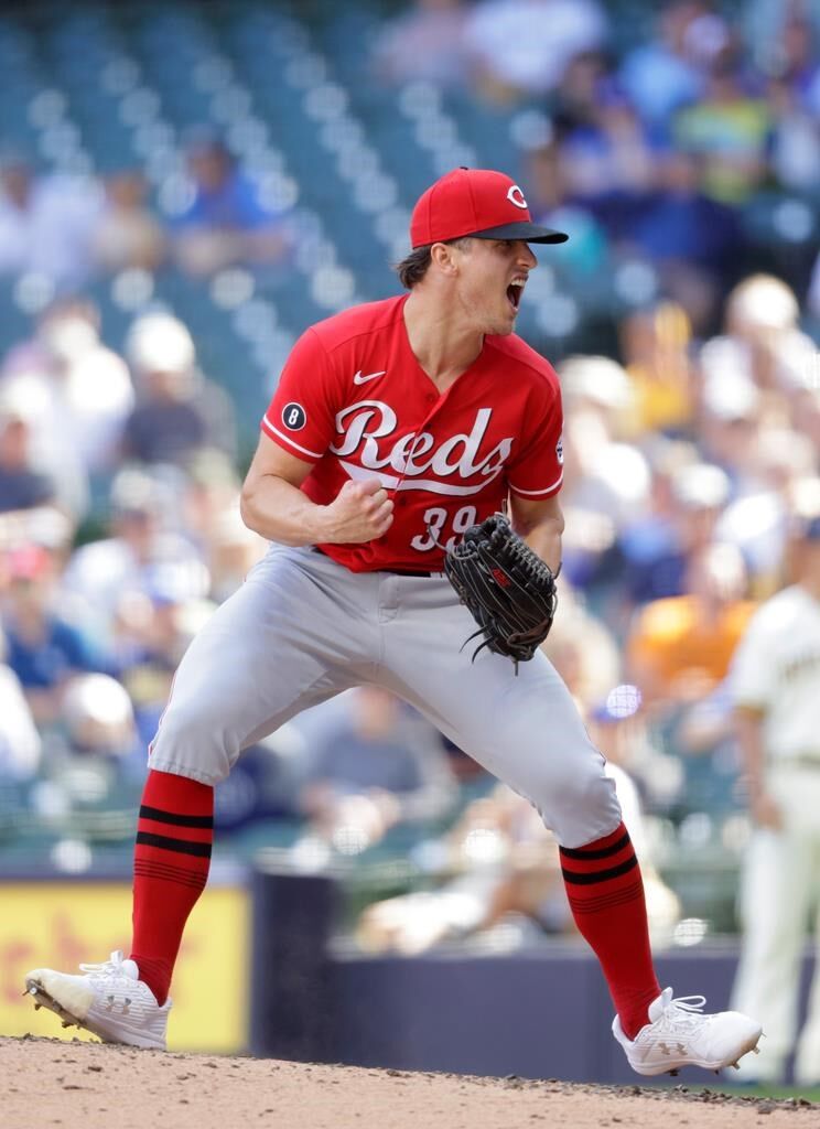 Mahle fans 12, Reds silence Brewers' bats again in 2-1 win