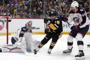 NHL roundup: Malkin reaches 20 goals for 15th time, Penguins edge Columbus 3-2
